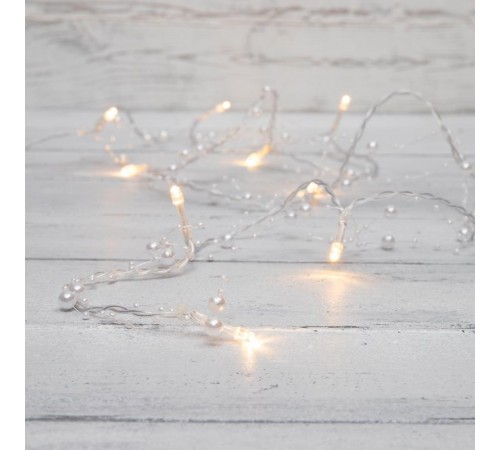 Гирлянда светодиодная Жемчужинки 1,5 м, 10 LED, прозрачный ПВХ, цвет свечения теплый белый, 2 х АА (батарейки не в комплекте)  303-097  NEON-NIGHT