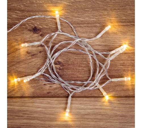 Гирлянда светодиодная универсальная 10 LED, 1,2 метра, прозрачный ПВХ, теплое белое свечение, батарейки 2хАА  303-073  NEON-NIGHT